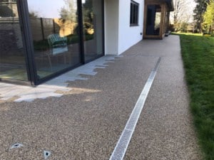 Resin bound path with a drainage channel beside glazing, Newent