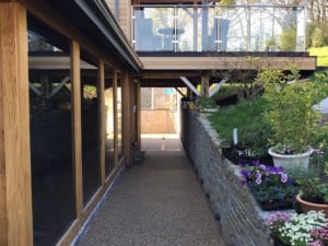 Resin bound path beside a glazed extension near Newent