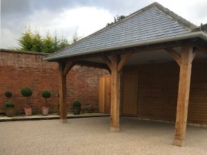 Riviera blend resin bound driveway with a timber carport in the Cotswolds