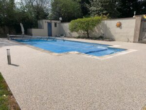 Resin bound pool surround at a private swimming pool
