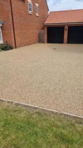Resin bound driveway in front of a double garage