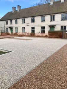 Resin bound driveway in front of a row of cottages