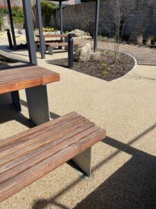 Resin bound seating area with timber picnic benches