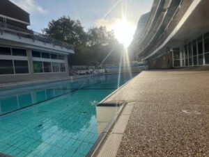 Resin bound poolside surround at a large building